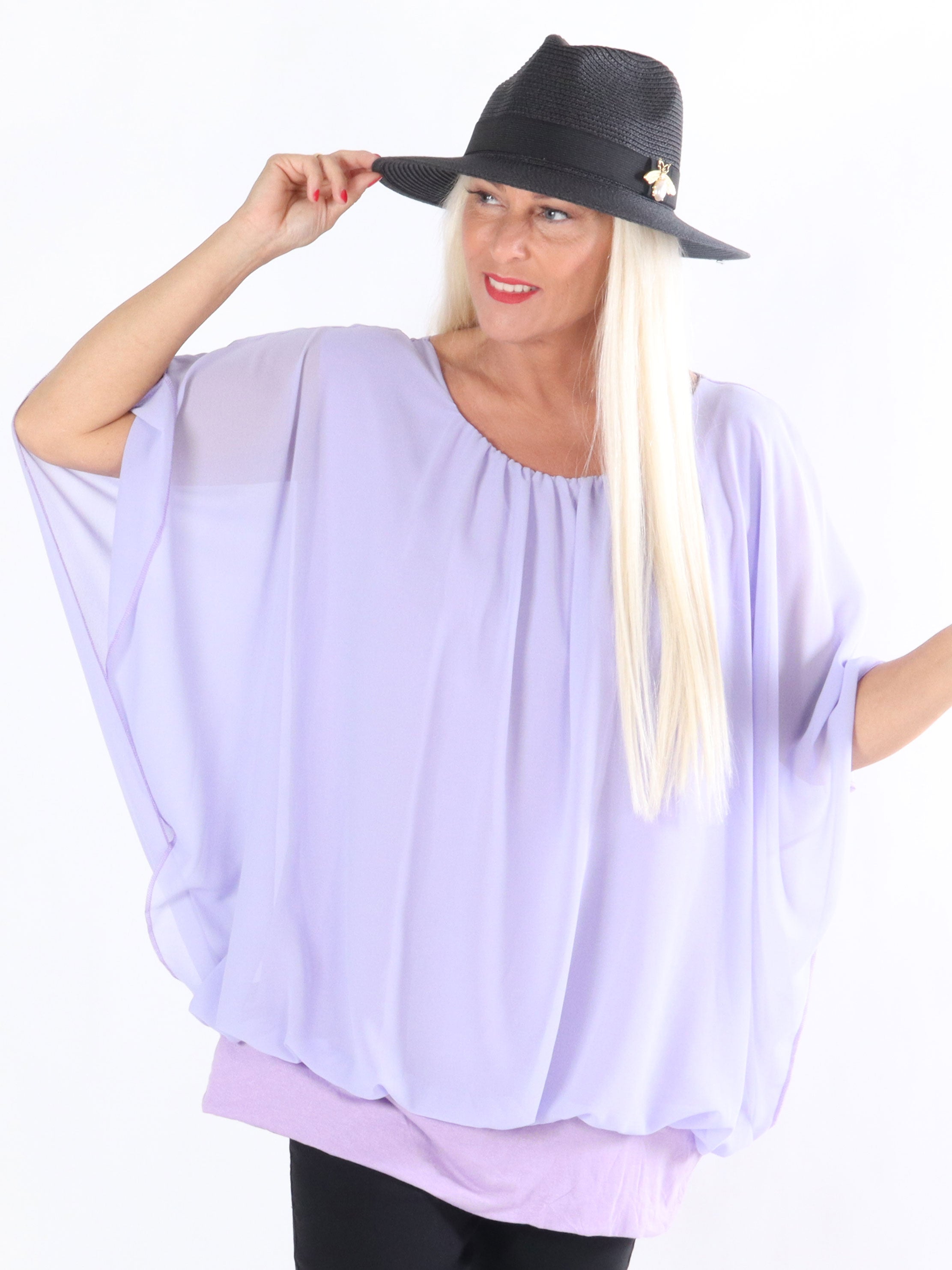 Cala - Elastisk top med løst chiffonstof udover